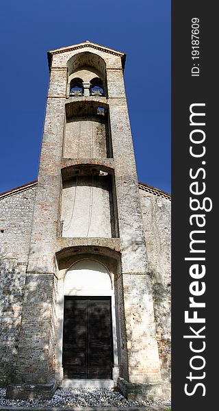 Ancient bell tower called sailing of the church of the fourteenth century. In Udine, Italy.