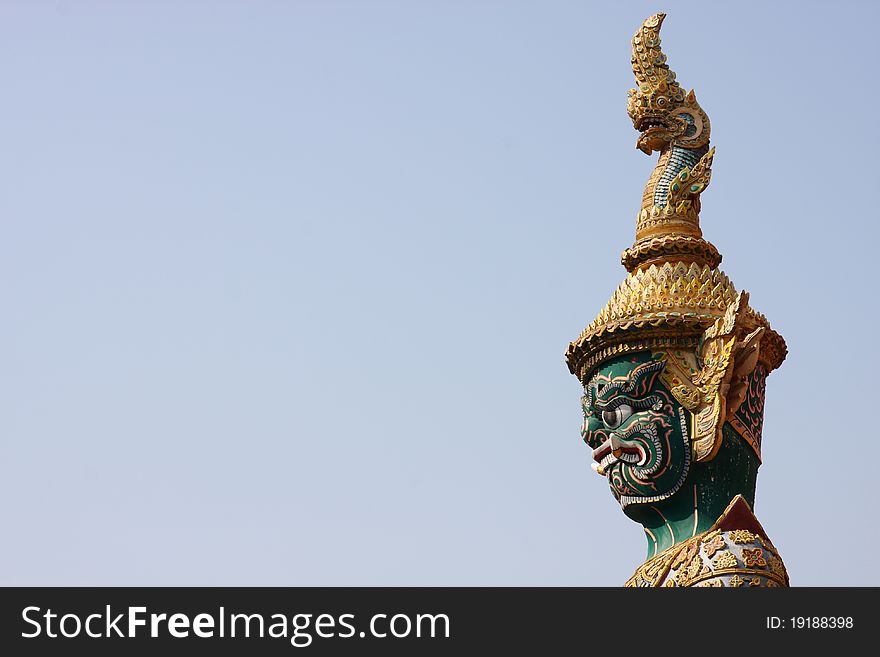 Giant demon head with sky, Grand palace, Thailand