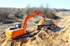 Backhoe Loader Loading Dumper Royalty Free Stock Photography Backhoe Loader Loading Dumper Royalty Free Stock Photography