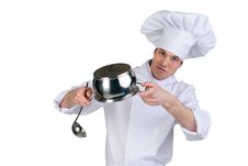 Cook With Pan And Ladle Stock Photography