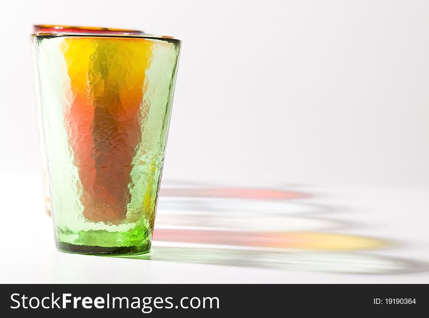 Six colorful murano glasses with reflection