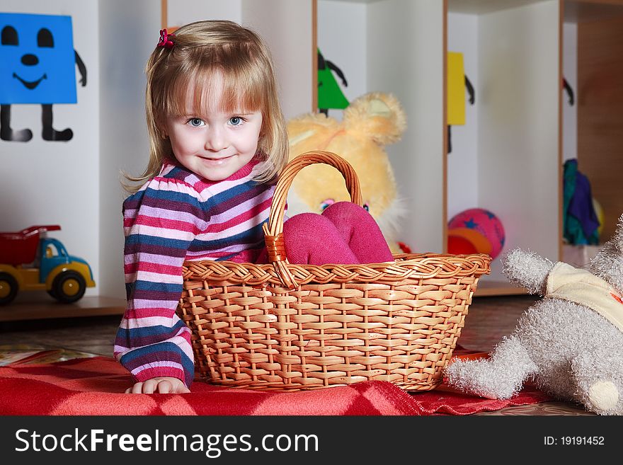 Little Girl With Basket Playing