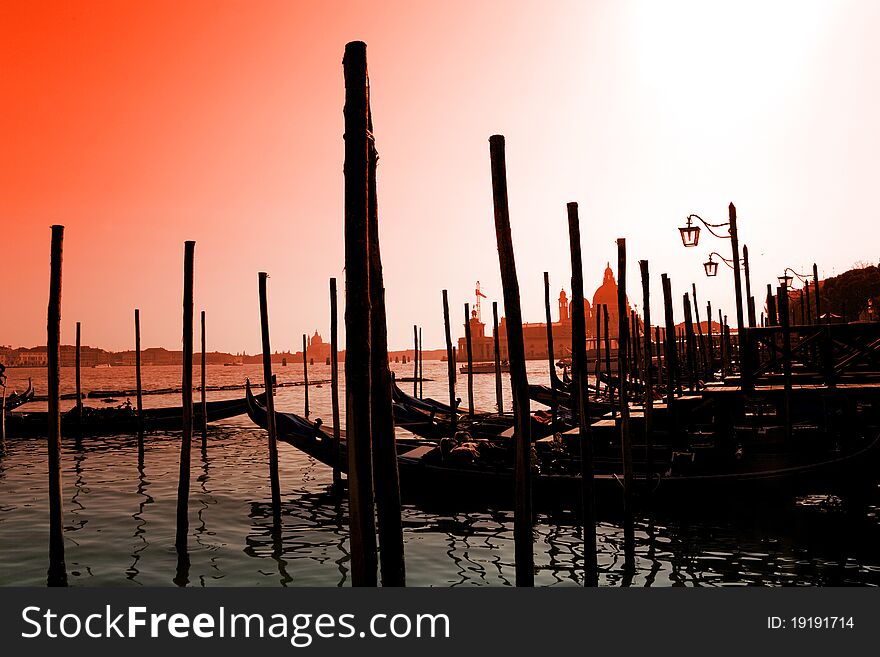 Romantic gondolas in the lagoon of venice