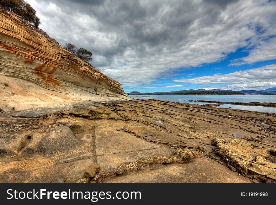 Natural sandstone formations on the beach in Tasmania. Natural sandstone formations on the beach in Tasmania.