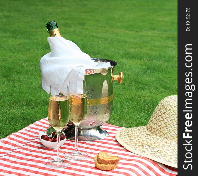 Champagne in the glass at a summer picnic