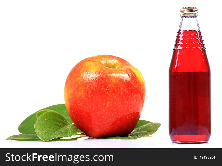 Apple squash bottle with red apple isoolated on white background.