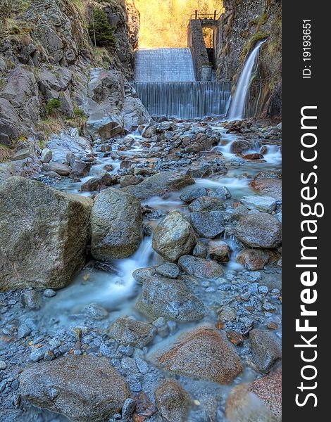 Cimbergo’s falls, created by the artificial lake of an hydroelectric power station, Brixia province, Lombardy region, Italy.