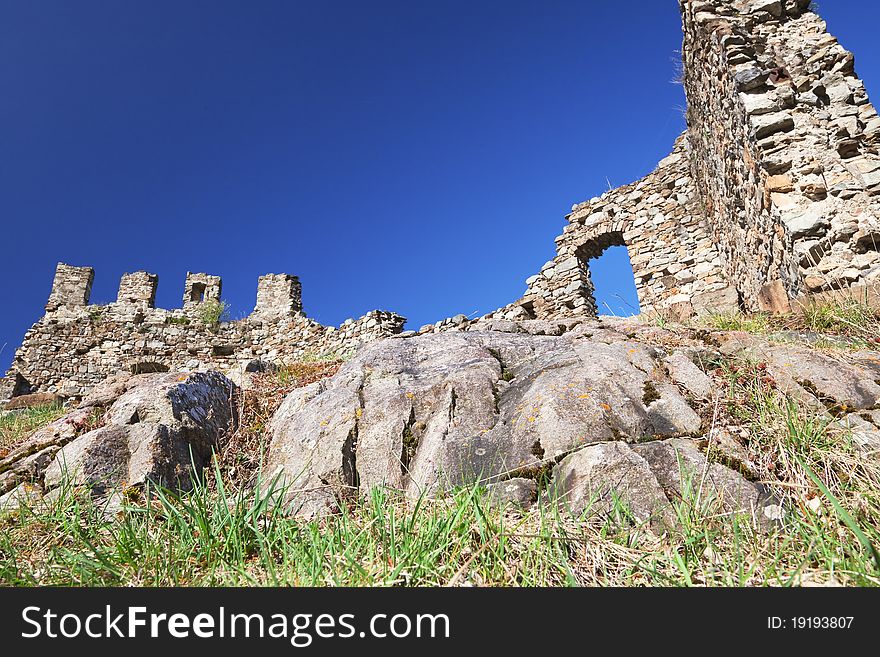 Ruins of the ancient Cimbergoâ€™s castle, XII century, in the North of Italy. Brixia province, Lombardy region. Ruins of the ancient Cimbergoâ€™s castle, XII century, in the North of Italy. Brixia province, Lombardy region