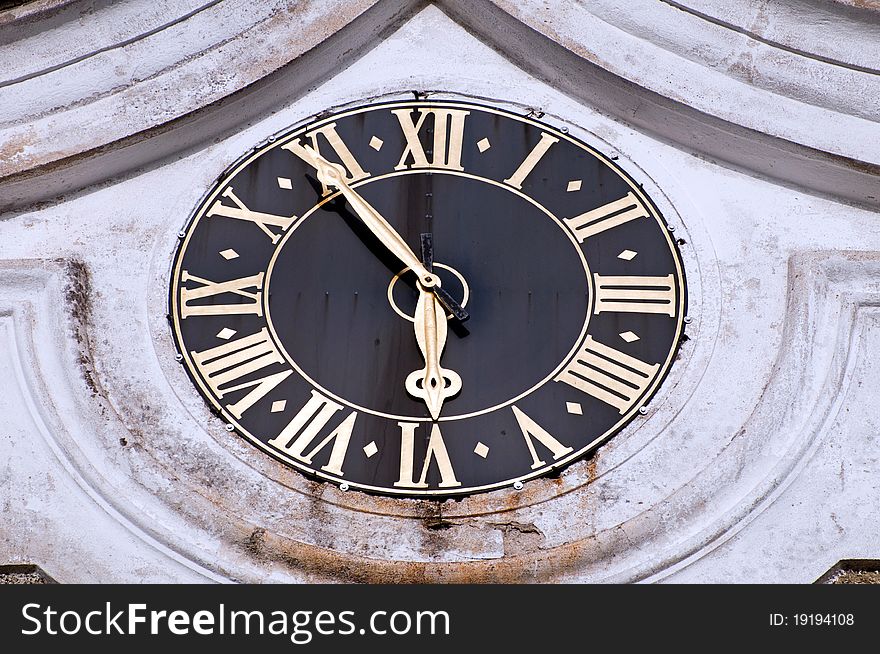 Detail of medieval clock on the outside of the churchl in Broumov, Czech Republic. Detail of medieval clock on the outside of the churchl in Broumov, Czech Republic.