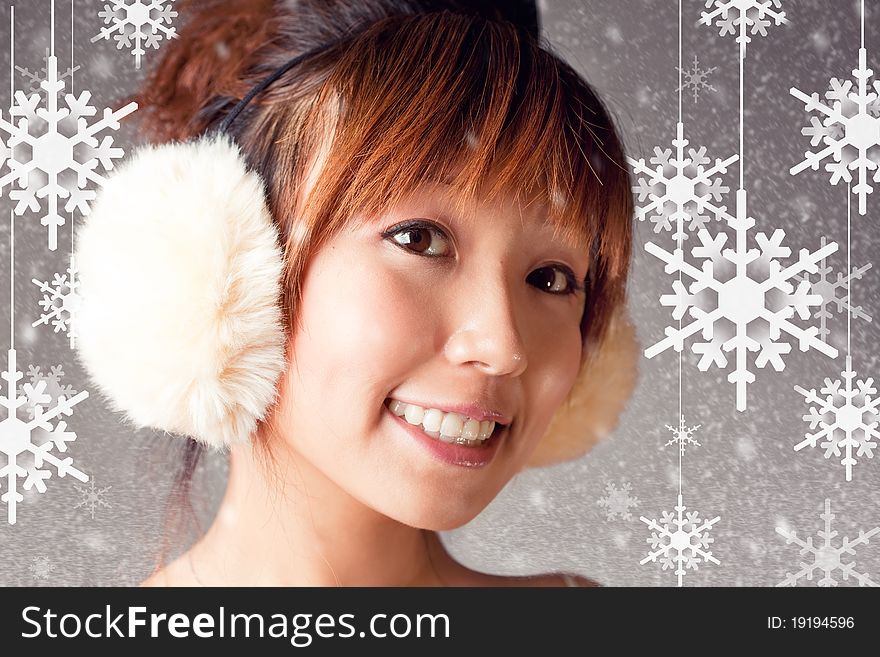 Young woman close up shoot, with vector snow flake as background. Young woman close up shoot, with vector snow flake as background.