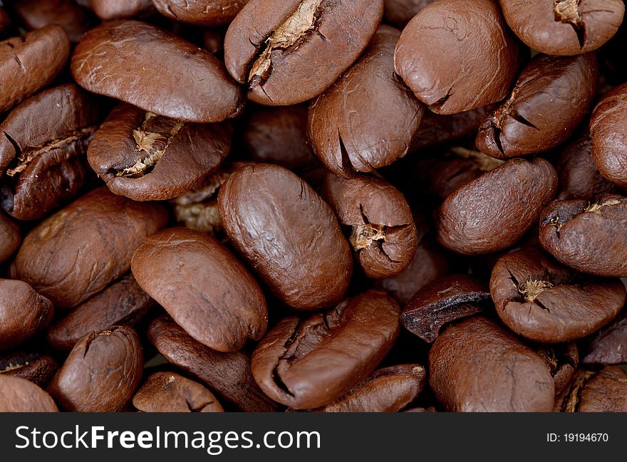 Brown coffee, background texture, close-up. Brown coffee, background texture, close-up