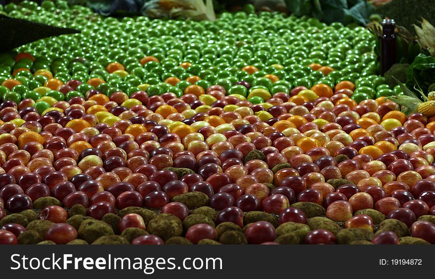 Many fresh apples and potatoes