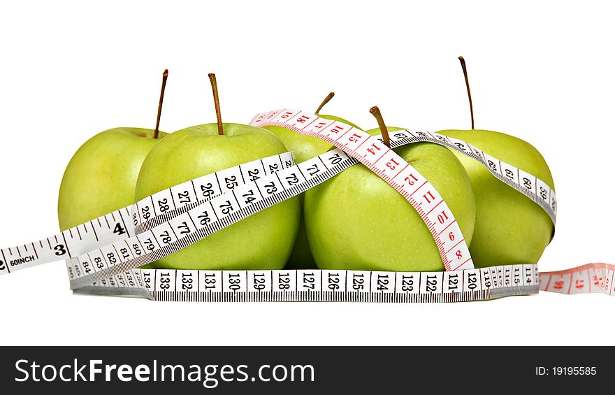 Fresh green apples with measuring tape, isolated on white