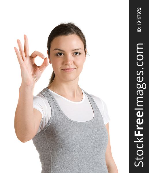 Caucasian girl shows gesture okay, isolated