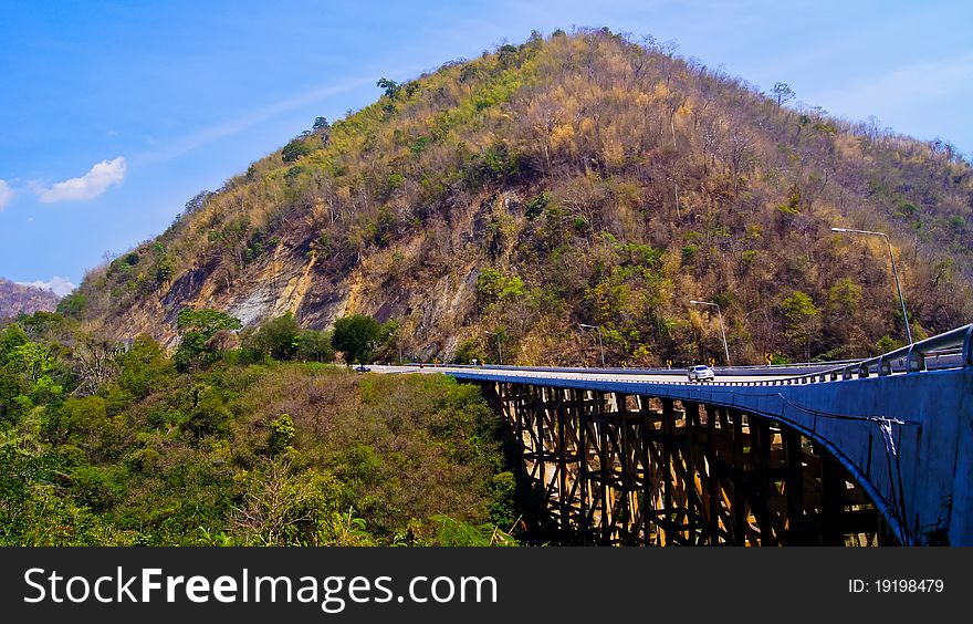 Bridge pass over valley in sunshine