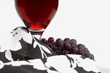 Low View Of A Wine Glass With Wine And Grapes And Napkin Royalty Free Stock Photo Low View Of A Wine Glass With Wine And Grapes And Napkin Royalty Free Stock Photo