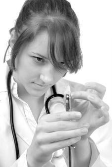 Female Doctor Holding Syringe Stock Photography Female Doctor Holding Syringe Stock Photography