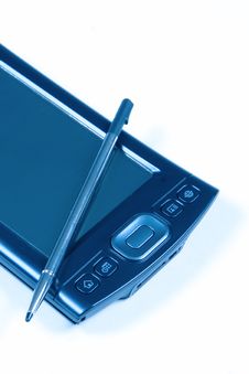 PDA And Pen In Blue Stock Photography