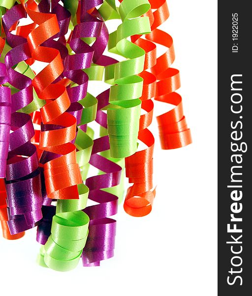 Bright colorful curly ribbons against a white background. Bright colorful curly ribbons against a white background