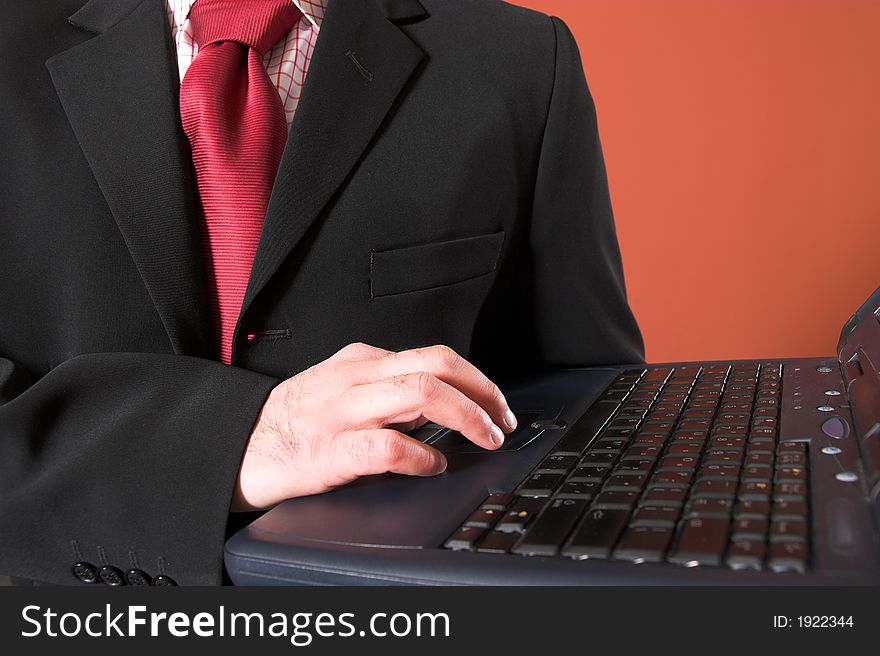 A Businessman using laptop computer