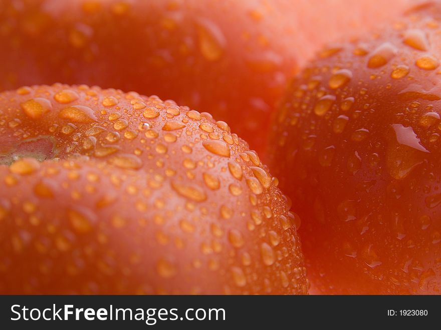 Fresh wet red tomato background texture. Macro. Fresh wet red tomato background texture. Macro.