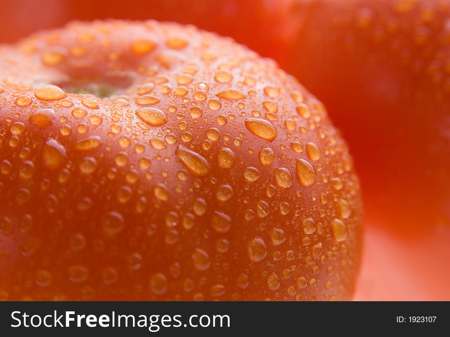 Fresh wet red tomato background texture. Macro. Fresh wet red tomato background texture. Macro.