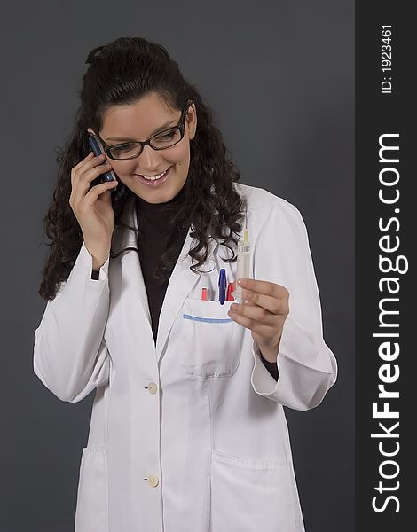 Young female doctor with injection