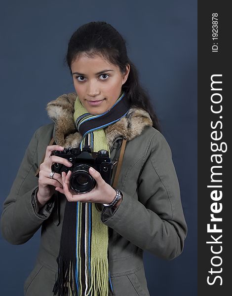 Young girl with camera