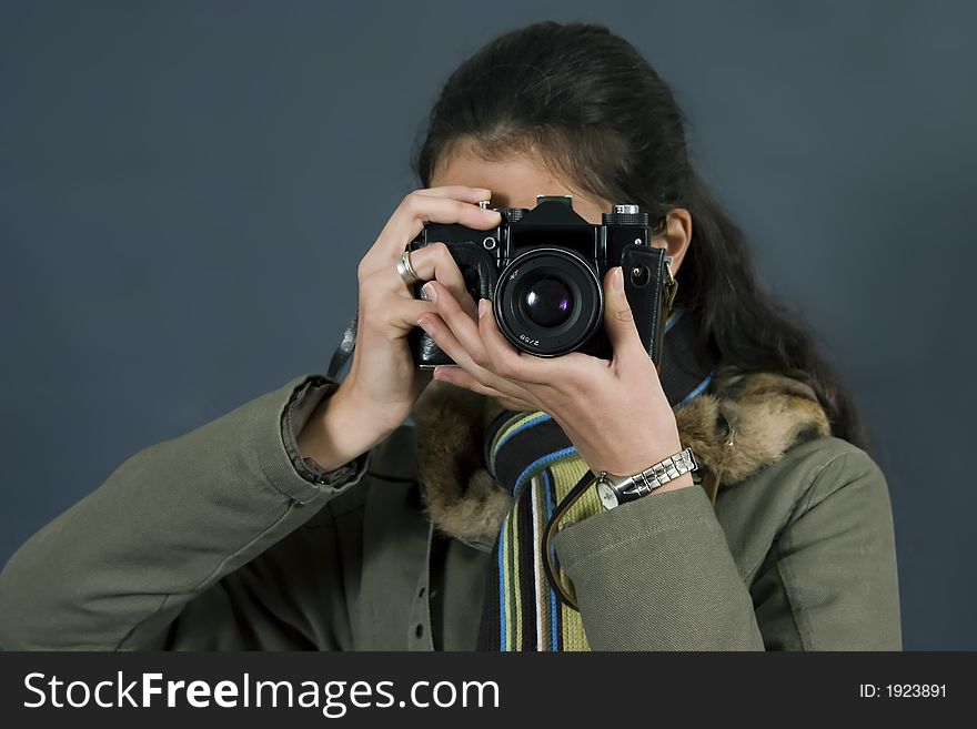 Young girl with camera