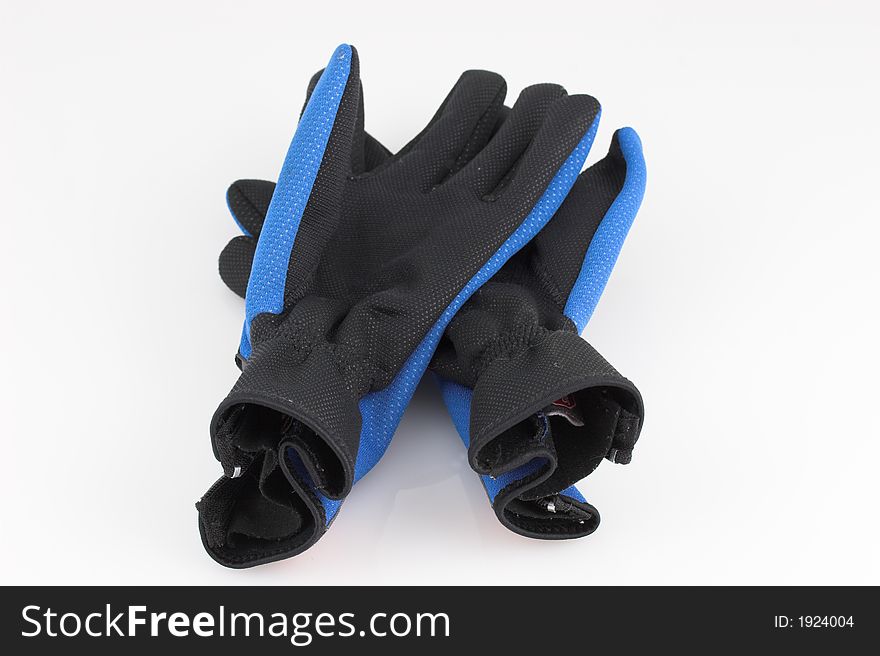 Pair of old sport gloves on white background