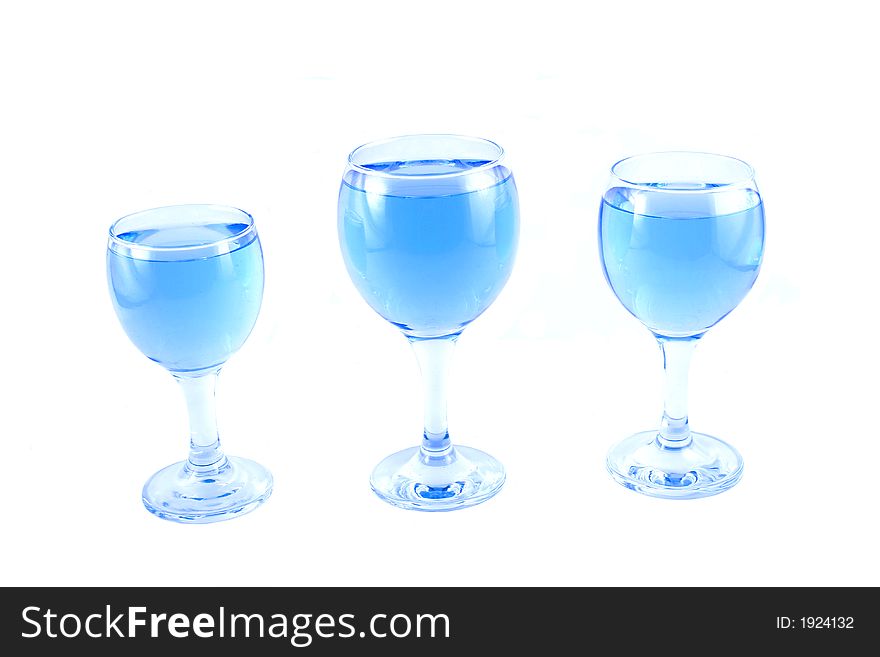 Glasses with a blue liquid