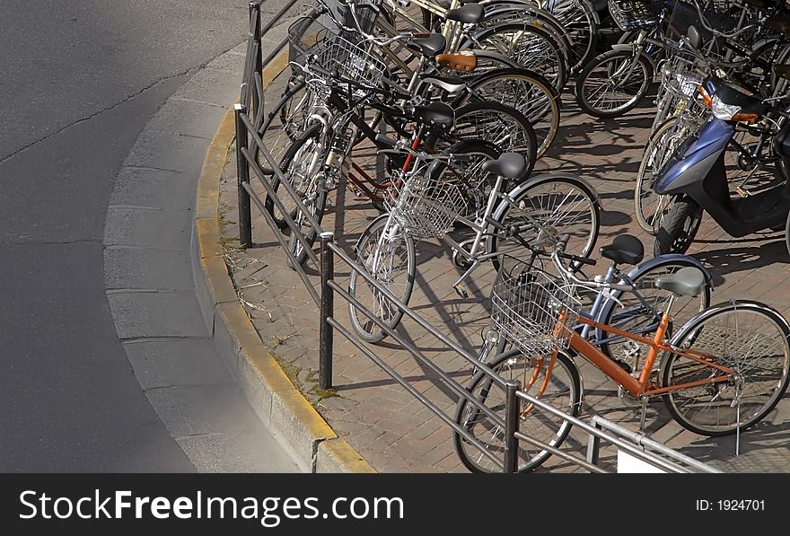 Bicycles parking in a big Asian city.