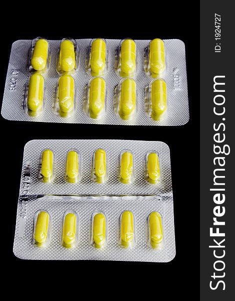 The set of pills isolated on black