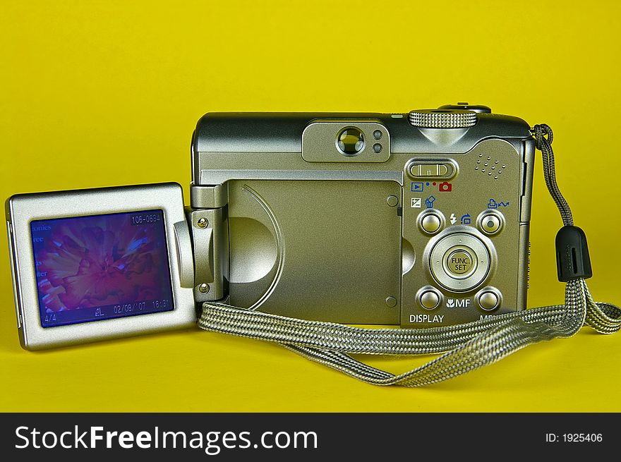 Compact digital camera in play back mode - isolated