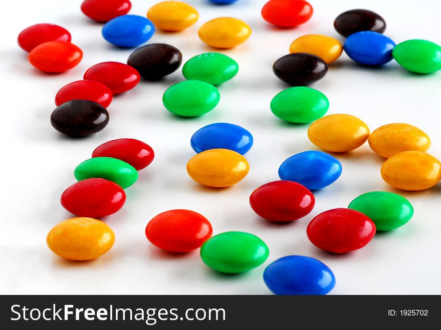 Candies with different colors on white background. Candies with different colors on white background