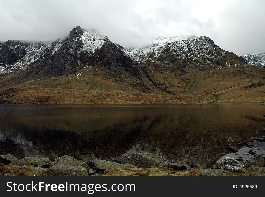 A lake in the cwm idwal national nature reserve. A lake in the cwm idwal national nature reserve