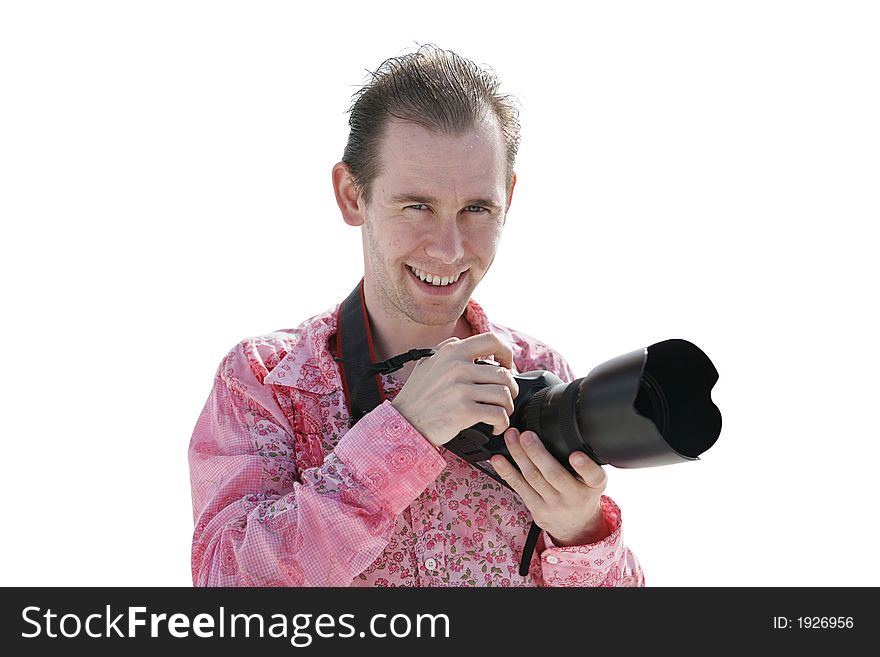 Portrait of a handsome young photographer on the beach. Portrait of a handsome young photographer on the beach.