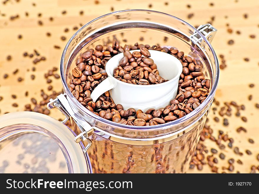 A lot of coffee beans in a cup