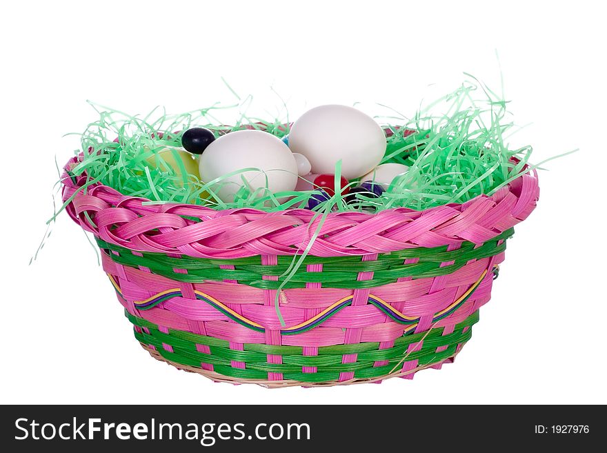 Pink Easter basket with green grass filled with jelly beans and blank eggs for branding. Pink Easter basket with green grass filled with jelly beans and blank eggs for branding