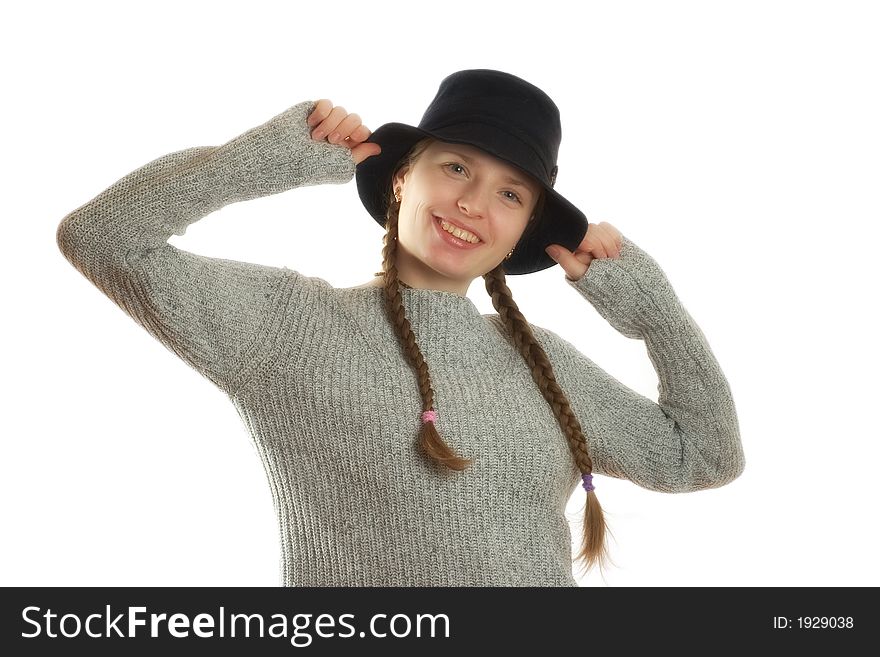 Charming young woman posing with a black hat. Charming young woman posing with a black hat