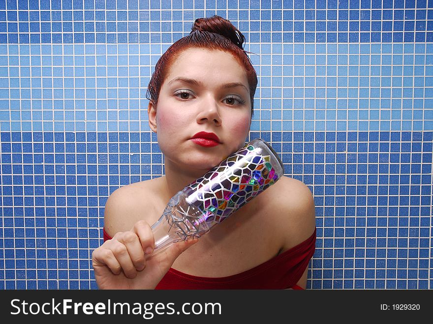 Girl with dyeing and colored bottle. Girl with dyeing and colored bottle