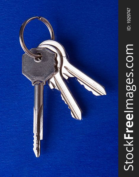 Bunch of keys on blue background