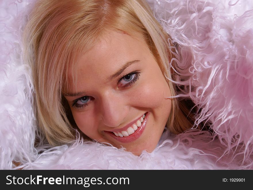 Young woman posing in a pink room. Young woman posing in a pink room