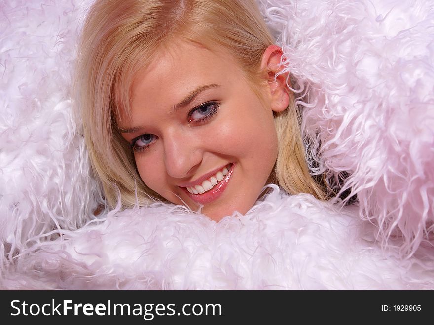 Young woman posing in a pink room. Young woman posing in a pink room