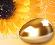 Gold Egg And Sunflower Royalty Free Stock Images