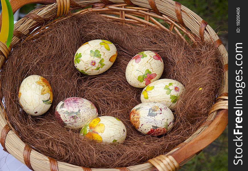 View colored easter eggs in the basket