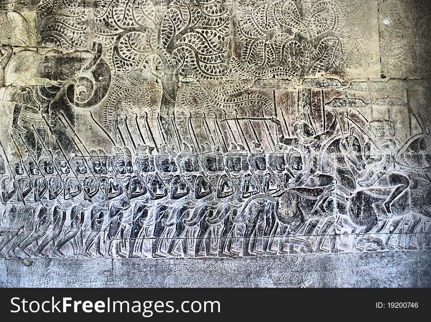 Warriors on a stone wall, Ankor Wat, Cambodia