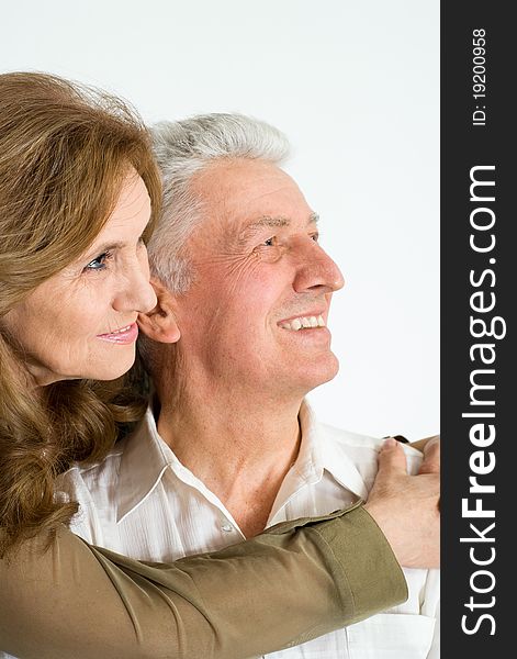 Nice elderly couple on a white background