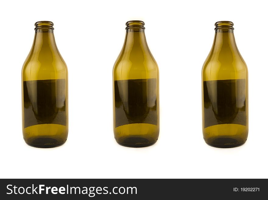Three empty beer bottles, isolated on white