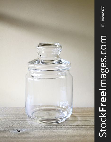 Old glass bottle on a wooden table